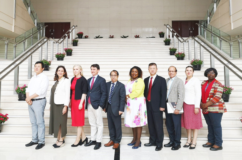 Photo of university representatives at round table